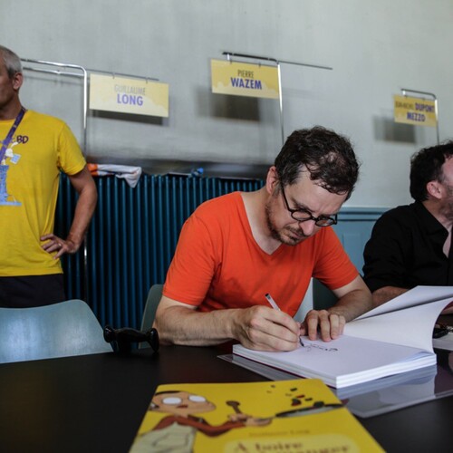 Guillaume Long et Pierre Wazem en dédicace.